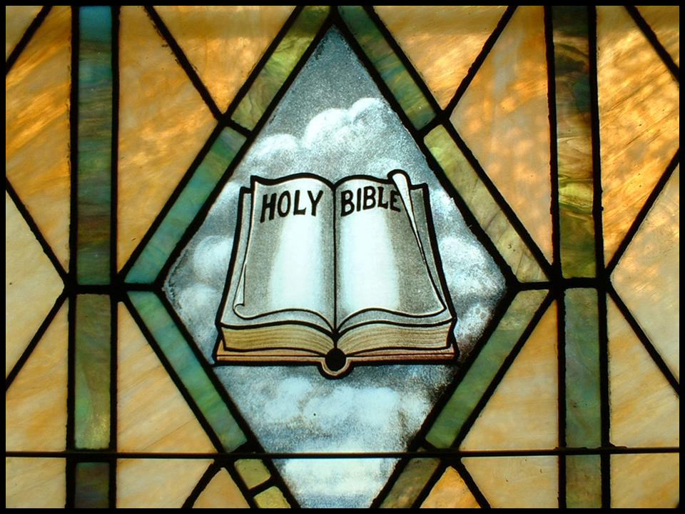 Bible image on a stained glass window.